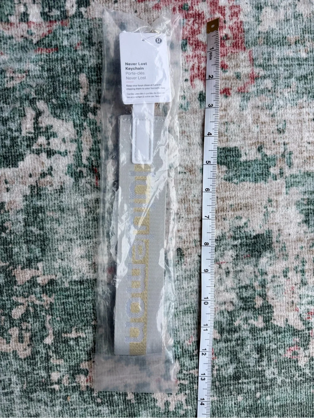 lululemon athletica Never Lost Keychain Lanyard in light grey with Gold Logo